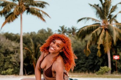 Pictures of Sbahle Mpisane turns up the heat at the beach-Zimmagazine
